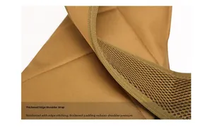 Close-up of padded shoulder strap with reinforced edging and breathable mesh backing