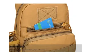 Detailed view of the front zipper pocket and velcro area on the tactical crossbody bag