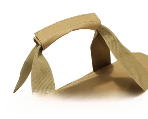Detail of khaki tactical bag handle with high-density nylon fabric and velcro wrap