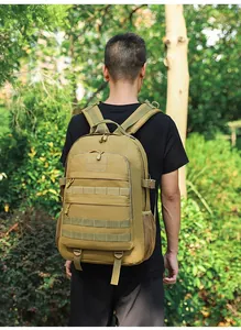 Close-up of khaki tactical backpack with MOLLE system and side mesh water bottle pocket