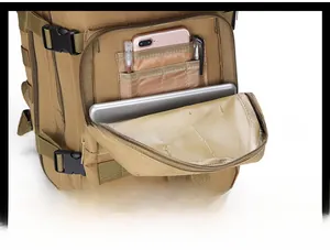 Tactical backpack front pocket detail showing interior organizer for pens and electronics