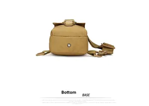 Base view of khaki tactical sling bag showing drainage hole and Molle D-rings