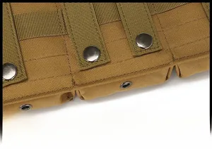 Detail of MOLLE tactical pouch showing nylon webbing and silver metal snap buttons