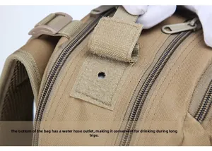 Detail of hydration port with velcro cover and honeycomb breathable mesh on tactical backpack