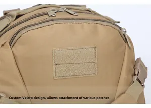Tactical backpack detail with durable hook and loop area for patches and sturdy dual zippers