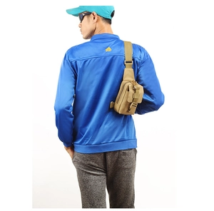 Detailed back view of the khaki tactical chest bag showing straps and MOLLE system