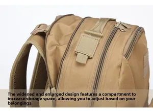Detail of expandable tactical backpack showing reinforced handle and multi-layer zippers