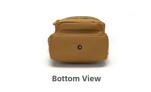 Tactical sling bag bottom view showing durable water-repellent fabric and metal drainage hole