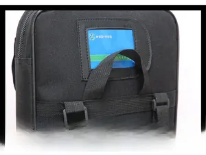 Close-up of black nylon tactical bag featuring a clear ID card slot and reinforced handle