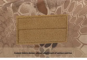 Detailed close-up of tactical backpack featuring python camo and Velcro for patches