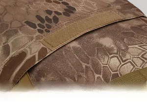 Close-up of tactical backpack expansion pouch with velcro closure and python camouflage