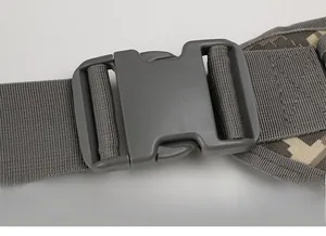 Detail of high-strength tactical buckle and camo nylon strap for outdoor sports bag