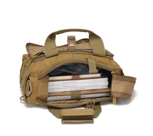 Tactical laptop tote bag showing large internal capacity with A4 magazine and laptop