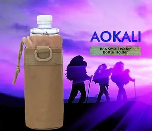 Tactical nylon water bottle pouch with drawstring and D-ring on outdoor background