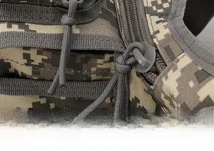 Macro shot of durable digital camouflage tactical bag featuring reinforced double stitching