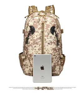 Tactical camouflage backpack size comparison with iPad Mini for outdoor travel use