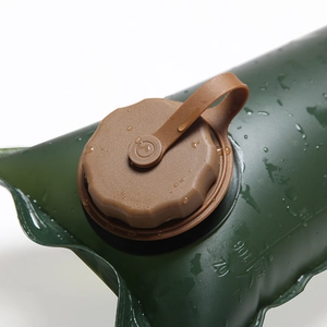 Macro detail of 3L TPU hydration bladder with brown screw cap and embossed scale
