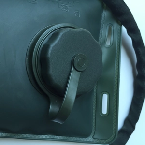 Macro shot of 3L TPU hydration bladder with black wide-mouth screw cap and leak-proof seal