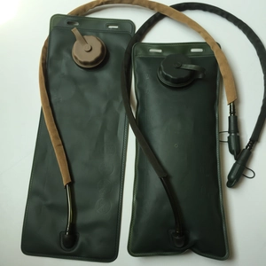 Detail of 3L TPU hydration bladders showing scale markings and leak-proof caps in army green