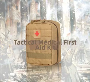 Close-up of tactical medical pouch with red cross patch and MOLLE system in desert tan