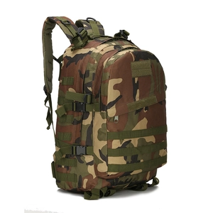 Detail view of military tactical backpack featuring durable woodland camouflage pattern