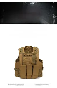 Detail view of khaki tactical vest featuring MOLLE webbing and triple magazine pouches
