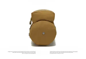 Tactical water bottle pouch reinforced round base with metal drainage hole detail