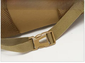 Detail of durable plastic buckle and nylon webbing on a khaki tactical backpack
