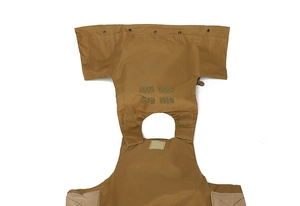 Detail of tan tactical vest showing MOLLE webbing system and durable nylon fabric