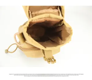 Internal view of a desert khaki tactical waist bag with durable buckle closure