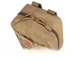 Detail view of khaki tactical medical bag with durable metal zippers and paracord pulls