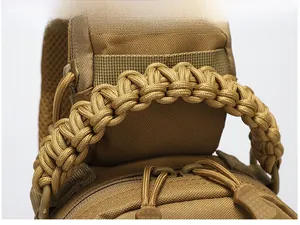 Detail of reinforced paracord braided handle on durable oxford tactical chest bag