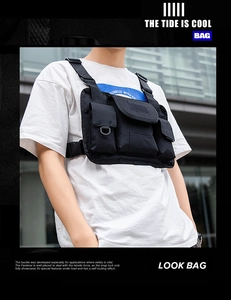 Close-up of tactical nylon chest bag featuring multiple pockets and durable buckles