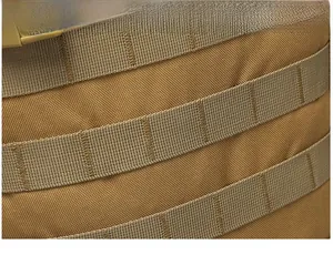 Detail of high-strength nylon MOLLE expansion system on khaki tactical backpack