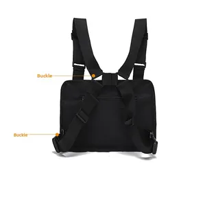 Close-up of durable buckle and adjustable strap on black tactical streetwear chest rig