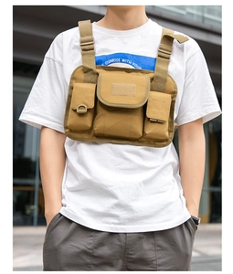 Tactical chest bag detail showing side pouches with velcro closure and reinforced stitching
