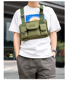 Detailed view of army green tactical chest bag with adjustable nylon straps and buckle