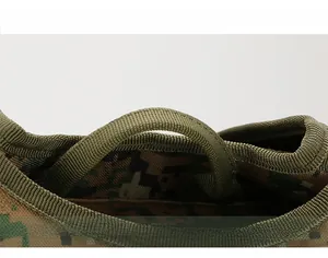 Detail of the reinforced high-density nylon handle on the camouflage tactical backpack