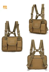 Detail view of the tactical tan nylon chest bag featuring H-shaped straps and MOLLE webbing