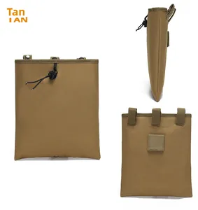 Detail view of tan tactical molle pouch with drawstring closure and durable nylon straps