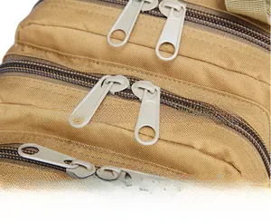 Close-up of tactical 3P backpack with durable dual zippers and khaki Oxford fabric detail