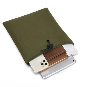 Army green nylon utility bag with drawstring showing tablet and accessories inside