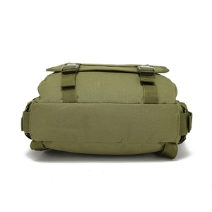 Detail view of durable olive green nylon backpack with metal buckle and webbing straps