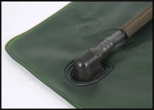 Macro detail of 3L food-grade TPU hydration bladder showing leak-proof tube connection