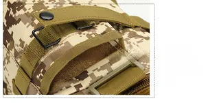 Macro detail of the tactical waist pack featuring digital camouflage and velcro storage compartment