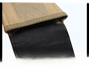 Macro detail of khaki tactical pouch with black shockproof velvet lining and velcro closure