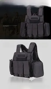 Detail of black tactical vest with durable nylon fabric and multiple modular mag pouches