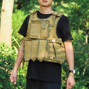 Detail view of khaki tactical vest with MOLLE system and adjustable side buckles