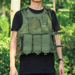Close-up of military green tactical vest with mag pouches and adjustable buckles