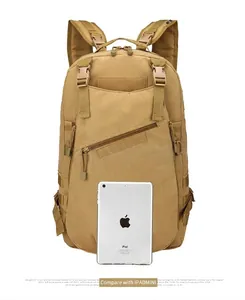 Tactical backpack size comparison with an iPad mini showing multi-pocket design